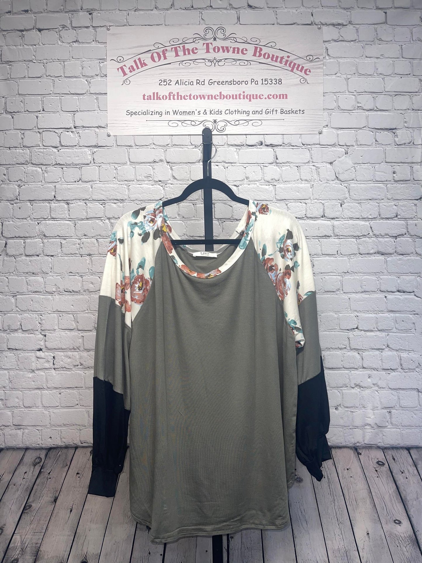 Plus size partially floral color block long sleeve top