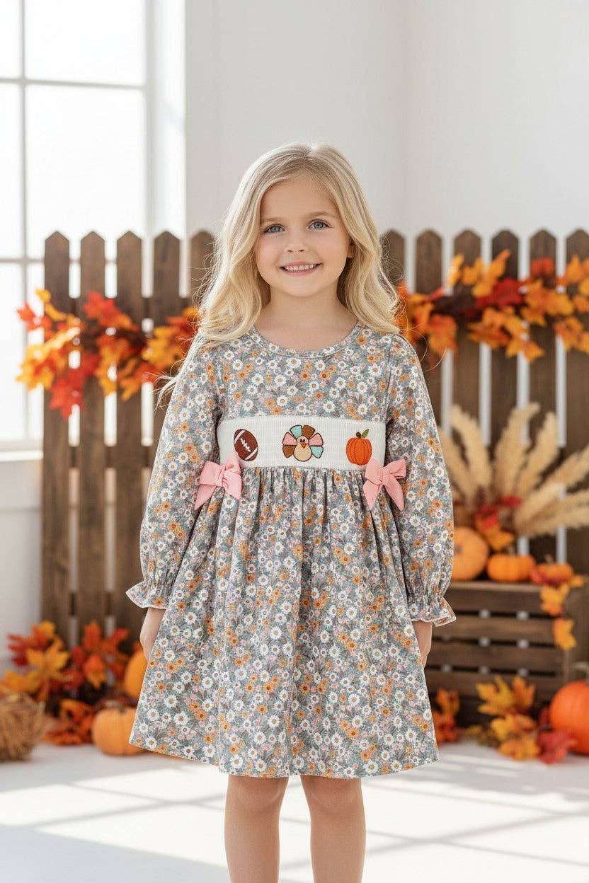 Floral girls dress / embroidery smocked detail.