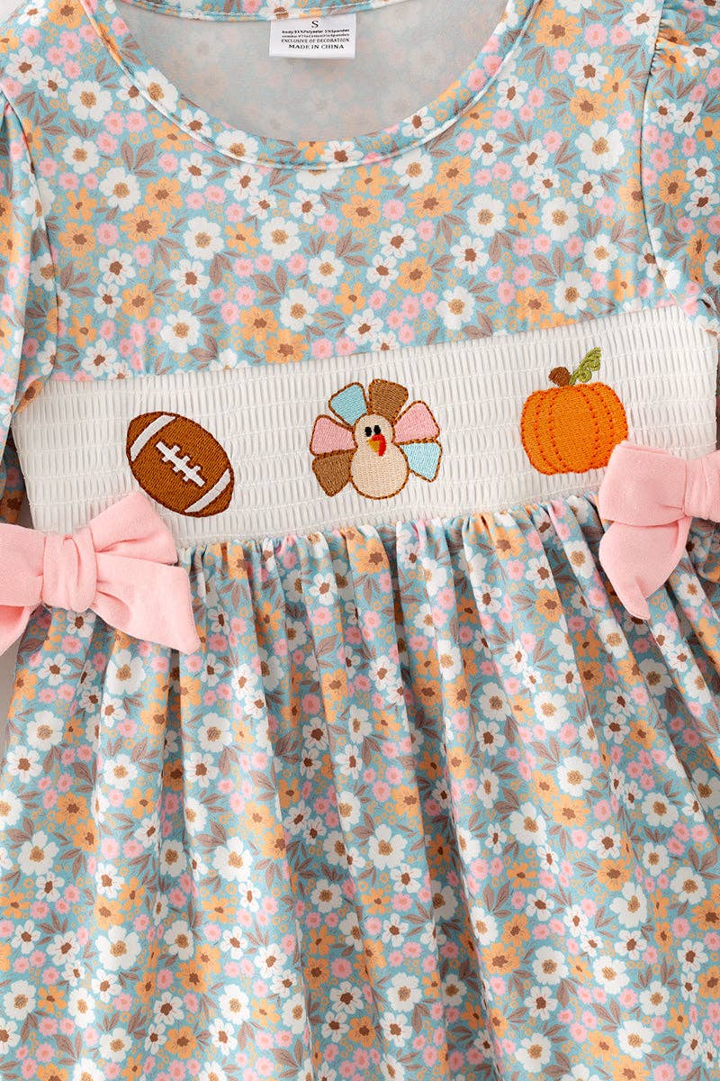 Floral girls dress / embroidery smocked detail.